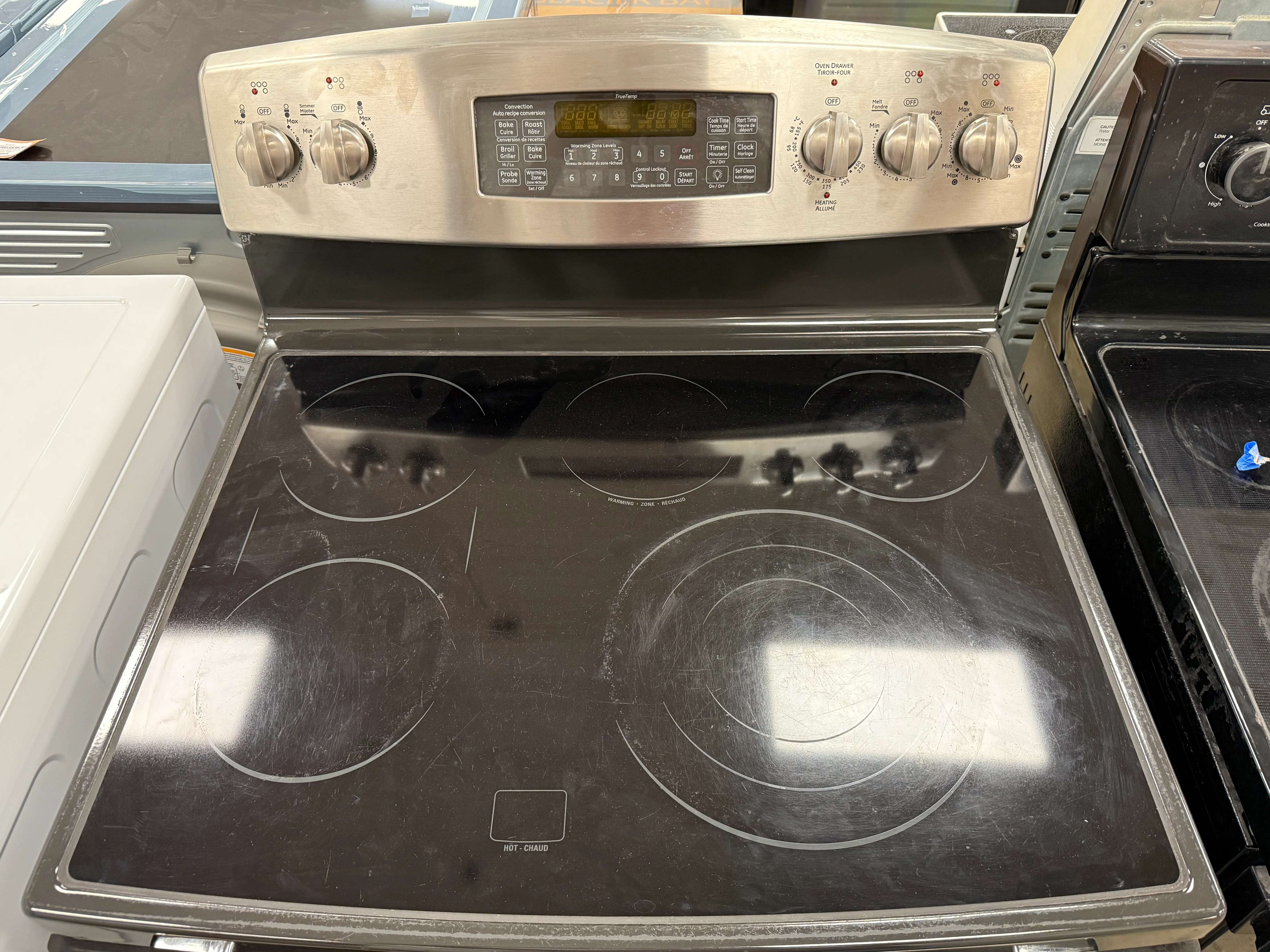 Black and Stainless Steel GE Free-Standing Electric Stove - Image 2
